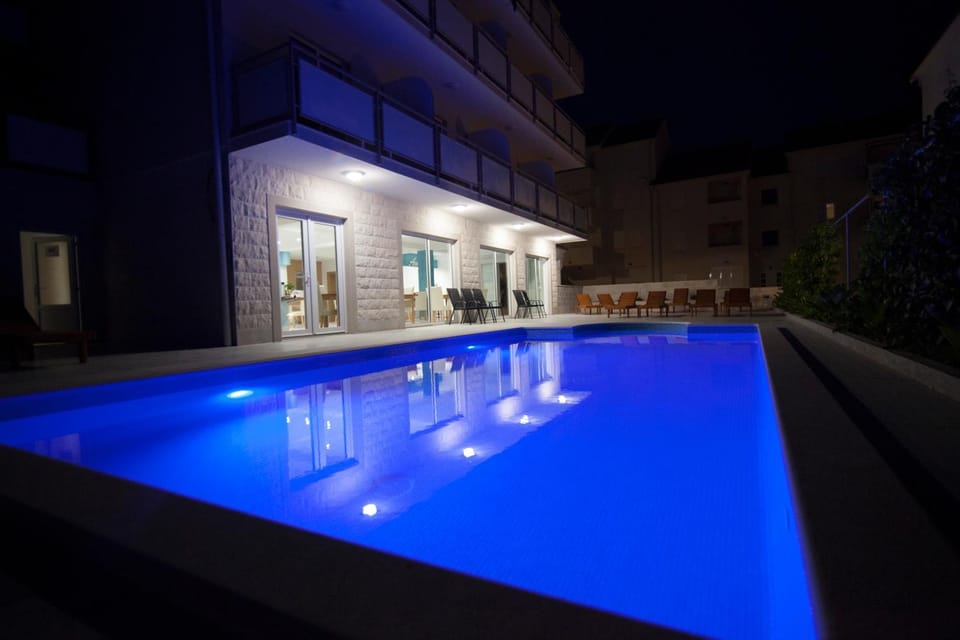 Property building, Night, Pool view, Swimming pool, Swimming pool