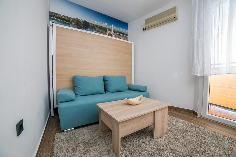 Bed, Living room, Seating area, Bedroom