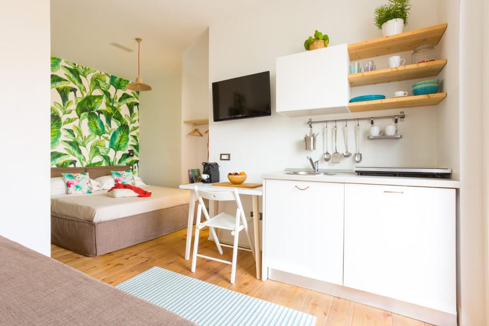 Duomo Views, Light, Jungle-inspired Studio with Terrace Apartment in Milan