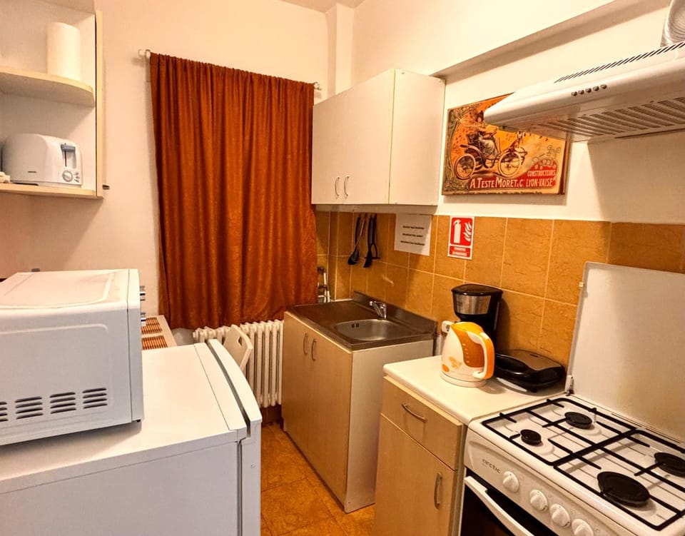 Kitchen or kitchenette, oven, toaster