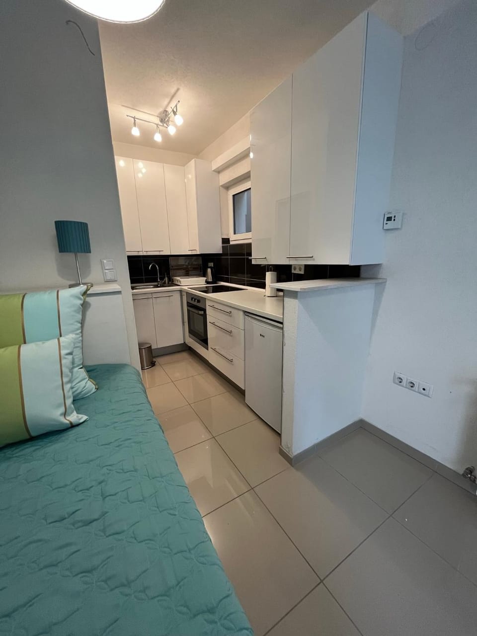 Bed, kitchen
