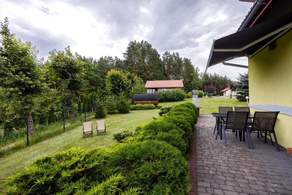 Property building, BBQ facilities, Garden, Sauna, Balcony/Terrace, Garden view, sunbed