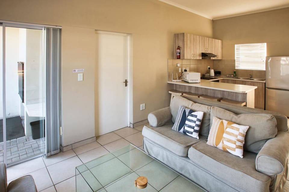 Living room, Seating area, fireplace, kitchen