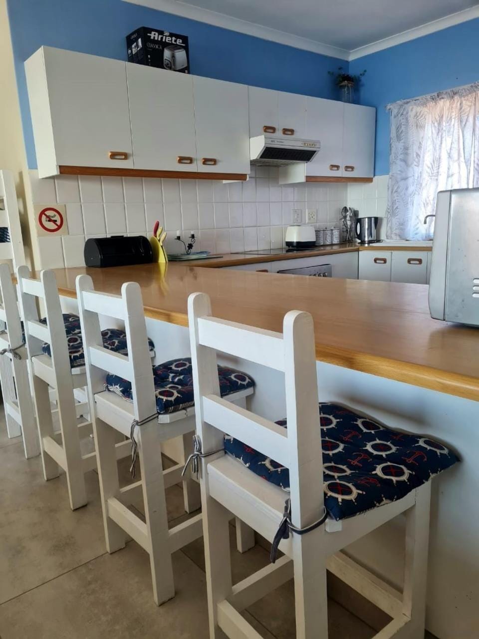 Kitchen or kitchenette, stove, toaster