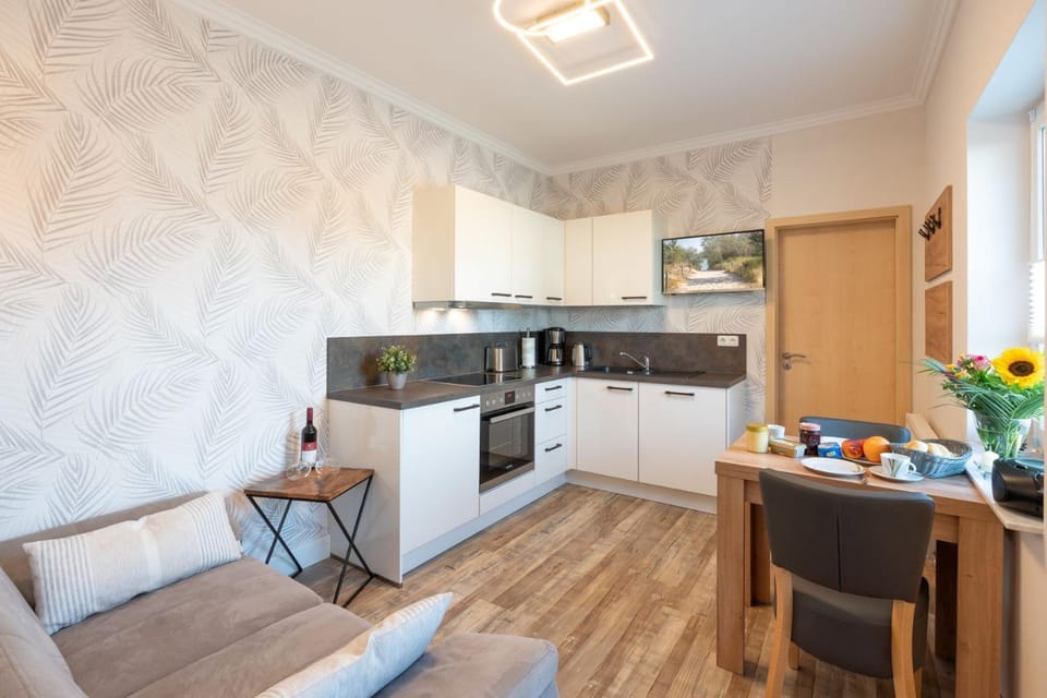 Kitchen or kitchenette, Living room, Seating area, oven