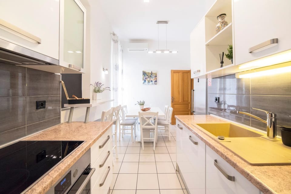 Kitchen or kitchenette, Dining area, dishwasher, oven, stove