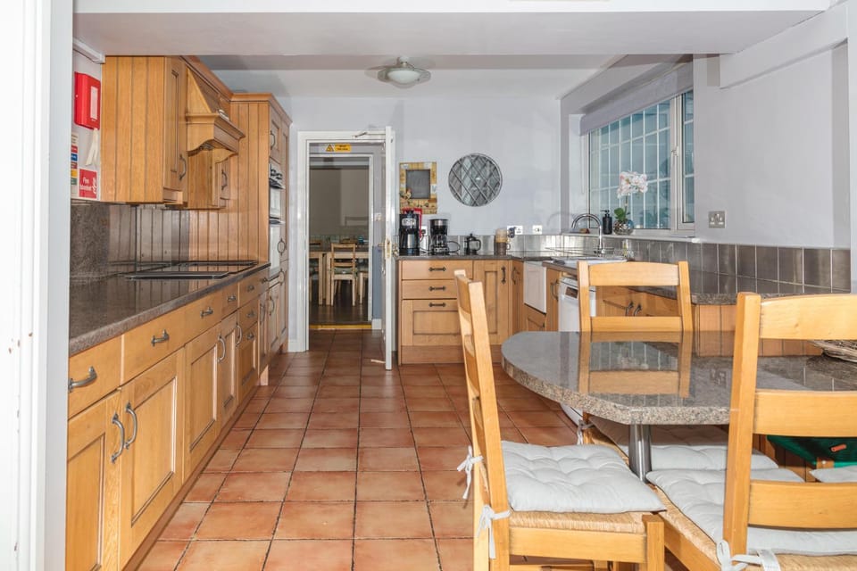 Kitchen or kitchenette, dishwasher, oven, stove