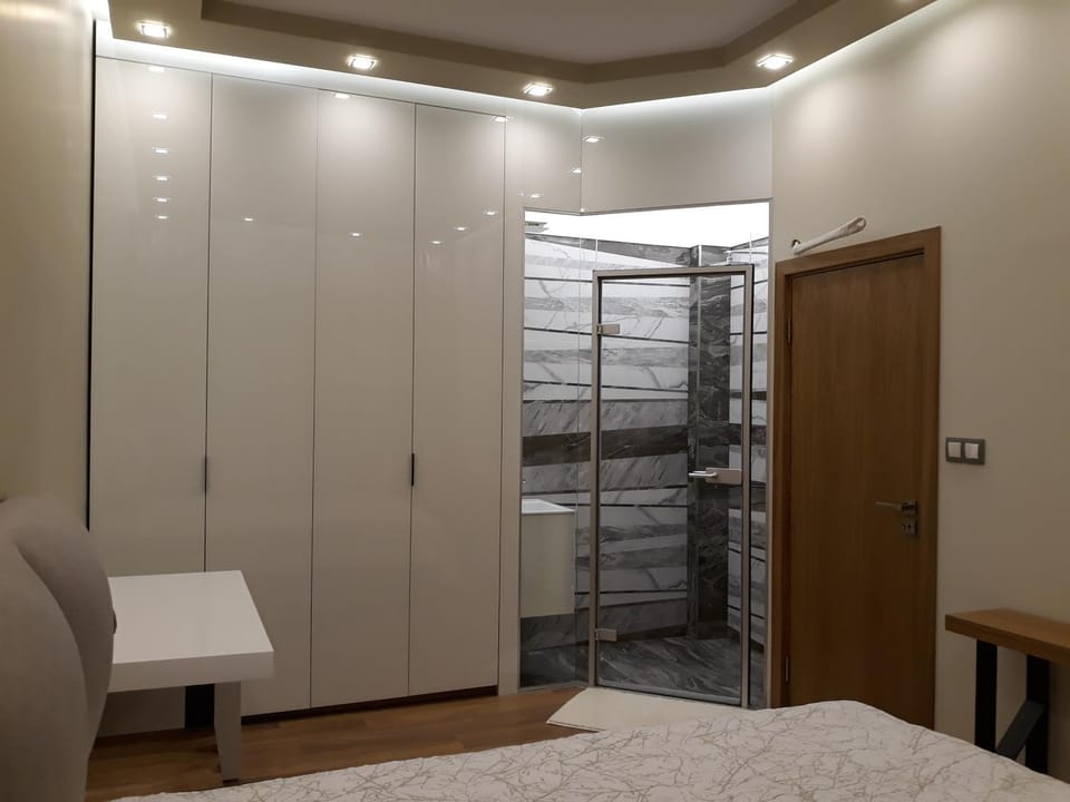Shower, Bathroom, Seating area, Bedroom