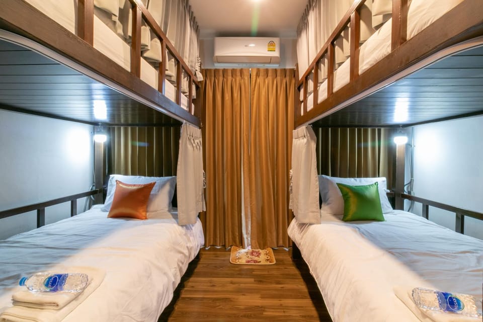 Photo of the whole room, Bedroom, bunk bed, towels, air conditioner