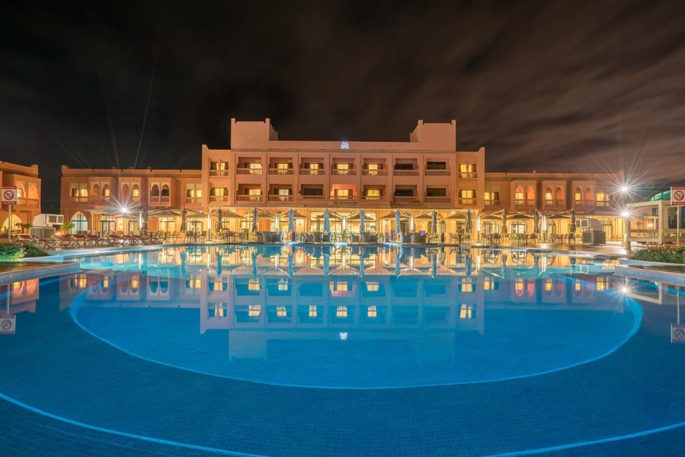 Property building, Night, Pool view, Swimming pool