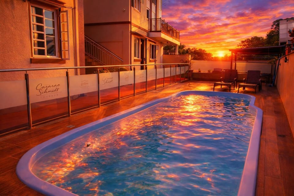 Property building, Swimming pool, Sunset