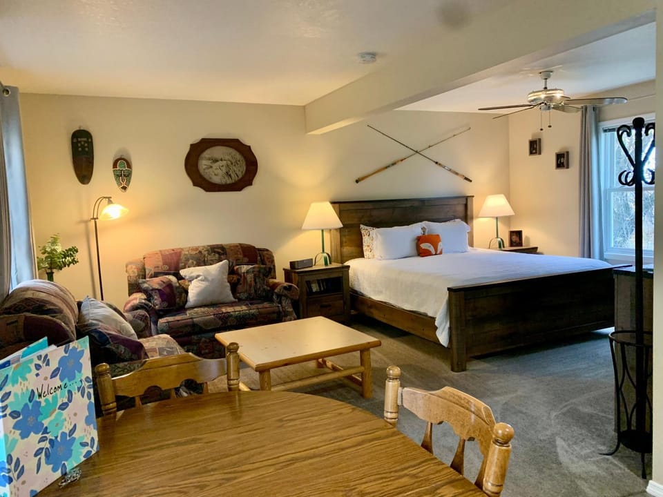 Bed, Living room, Seating area, Bedroom