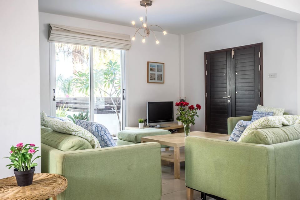 Living room, Seating area, Pool view