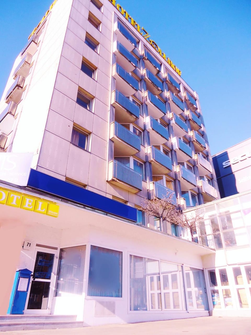 Property building, Facade/entrance, Day