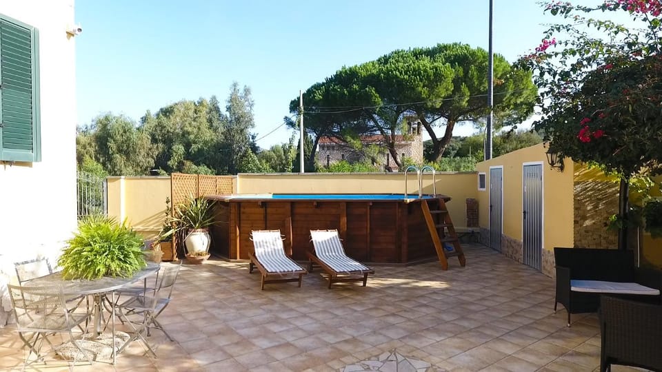 Property building, Facade/entrance, Garden, Pool view, Swimming pool