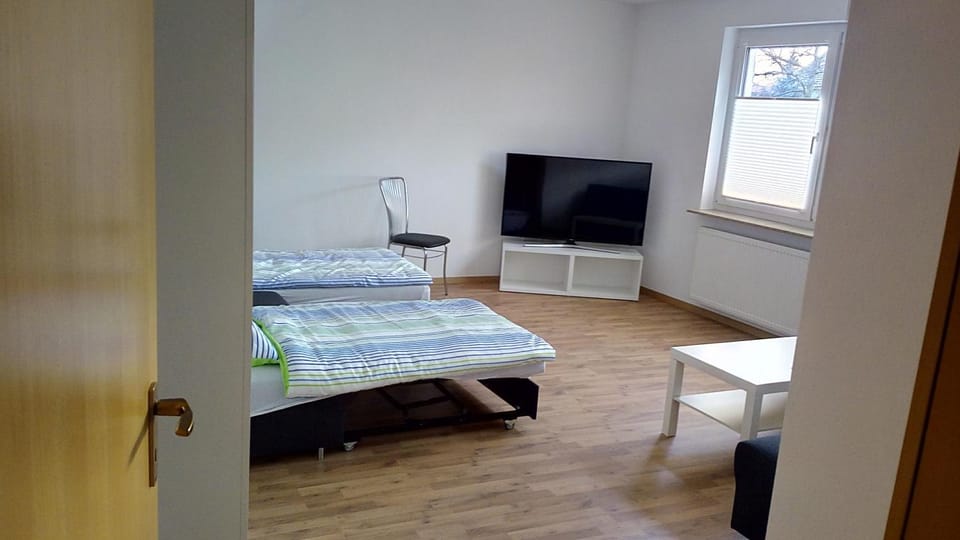 Bed, TV and multimedia, View (from property/room), Living room, Other, Other, Photo of the whole room, Decorative detail, Decorative detail, Seating area, Dining area, Bedroom, Text overlay, Street view, Area and facilities
