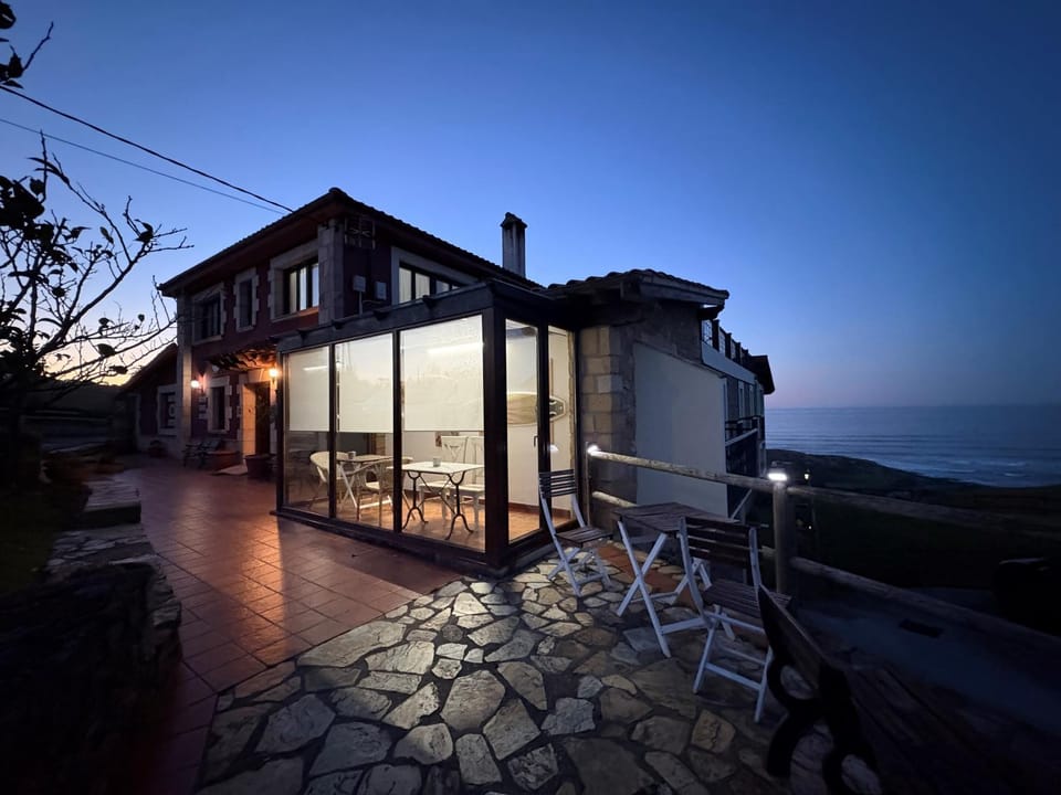 Property building, Night, Natural landscape, View (from property/room), Balcony/Terrace, Dining area, Sea view