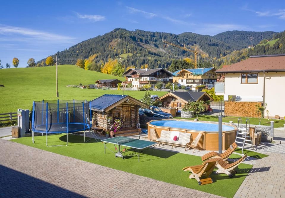 Facade/entrance, BBQ facilities, Children play ground, Garden, Table tennis, Balcony/Terrace, Garden view, Mountain view, Pool view