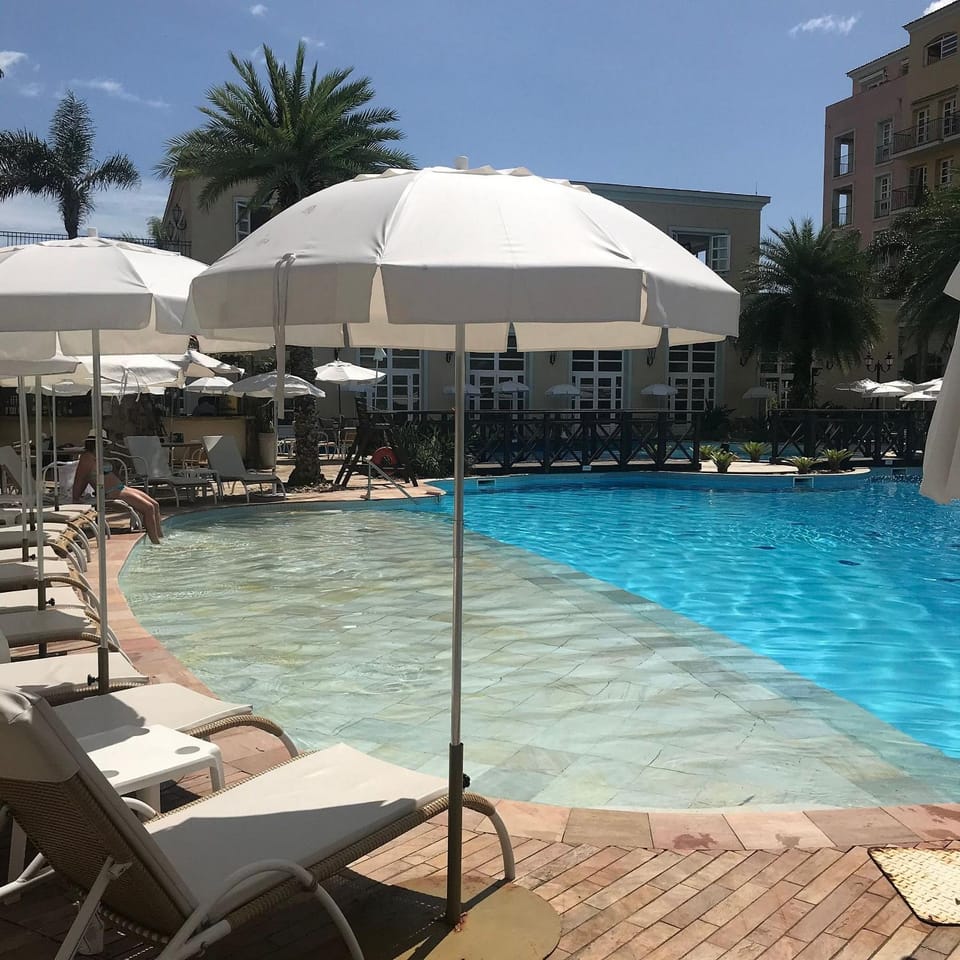 Swimming pool, sunbed