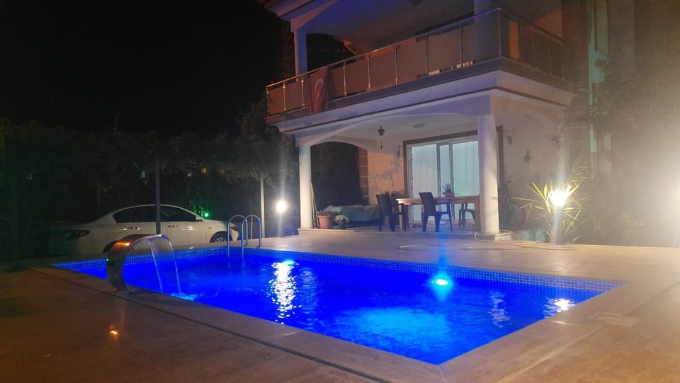 Property building, Night, Pool view, Swimming pool, sunbed