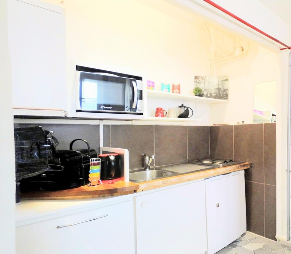 Kitchen or kitchenette, stove, toaster