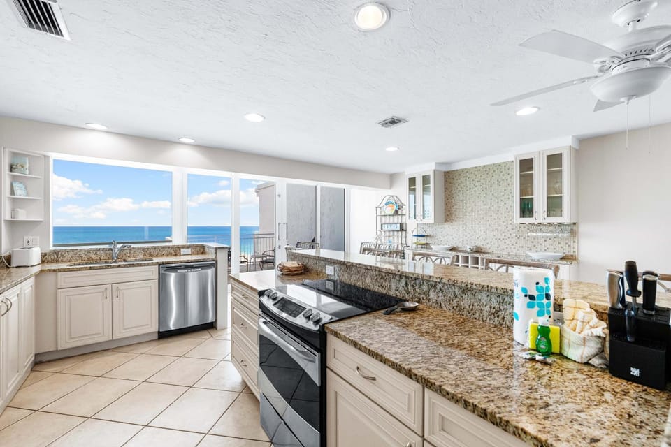 Kitchen or kitchenette, Sea view, dishwasher, oven, stove