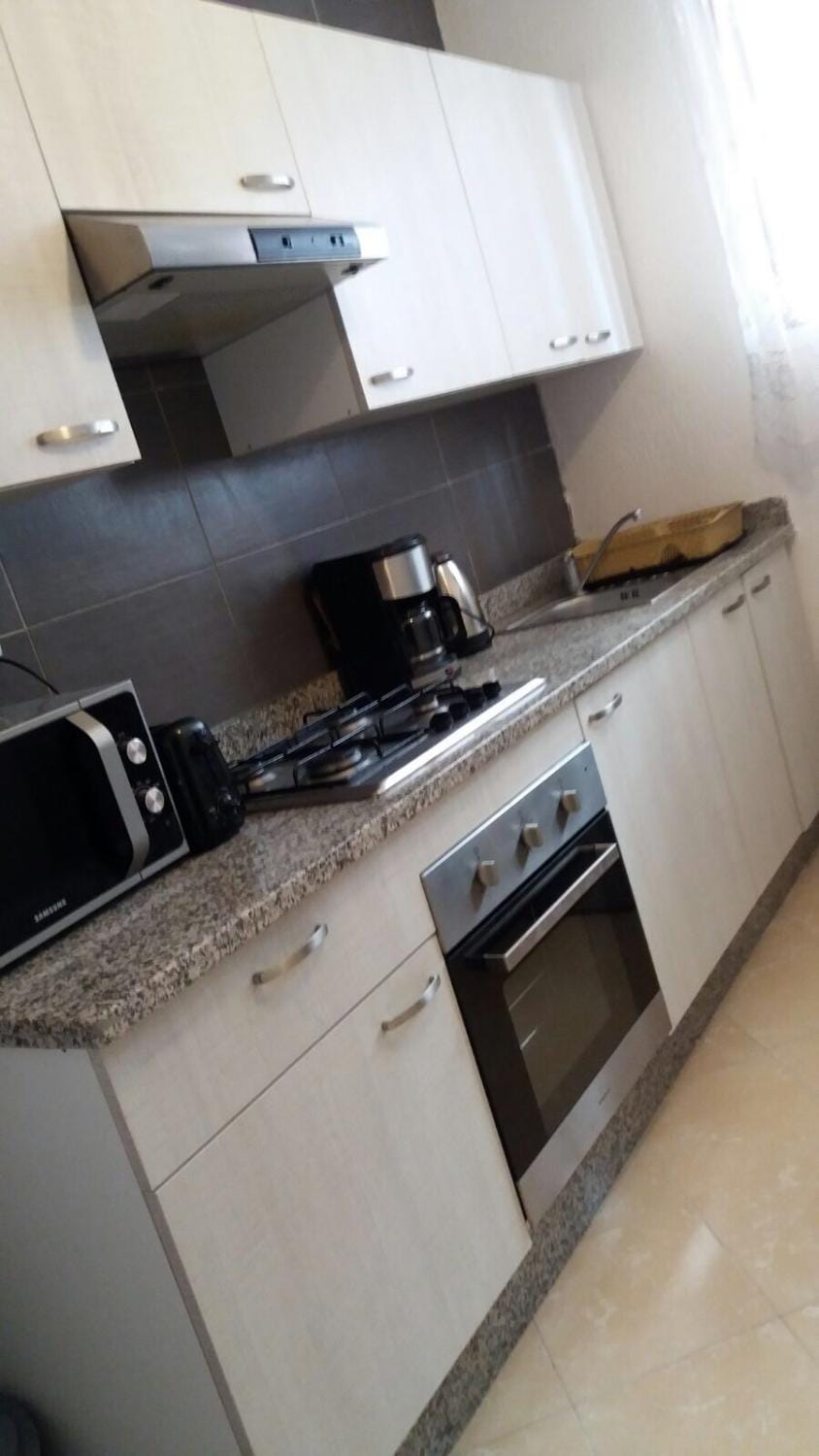 Kitchen or kitchenette, stove
