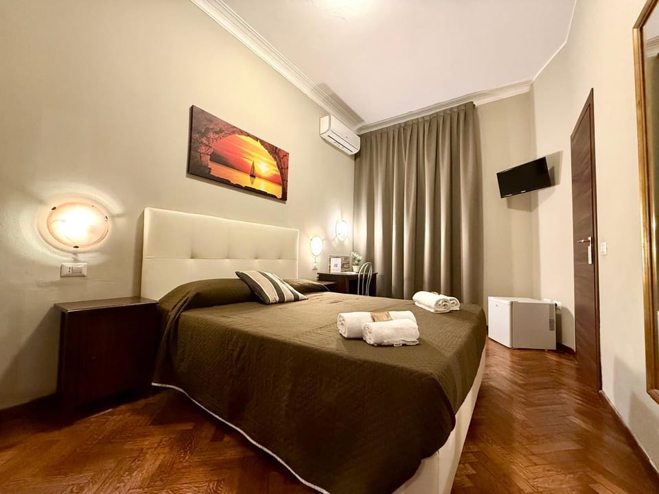 Bed, Photo of the whole room, Bedroom, towels, air conditioner
