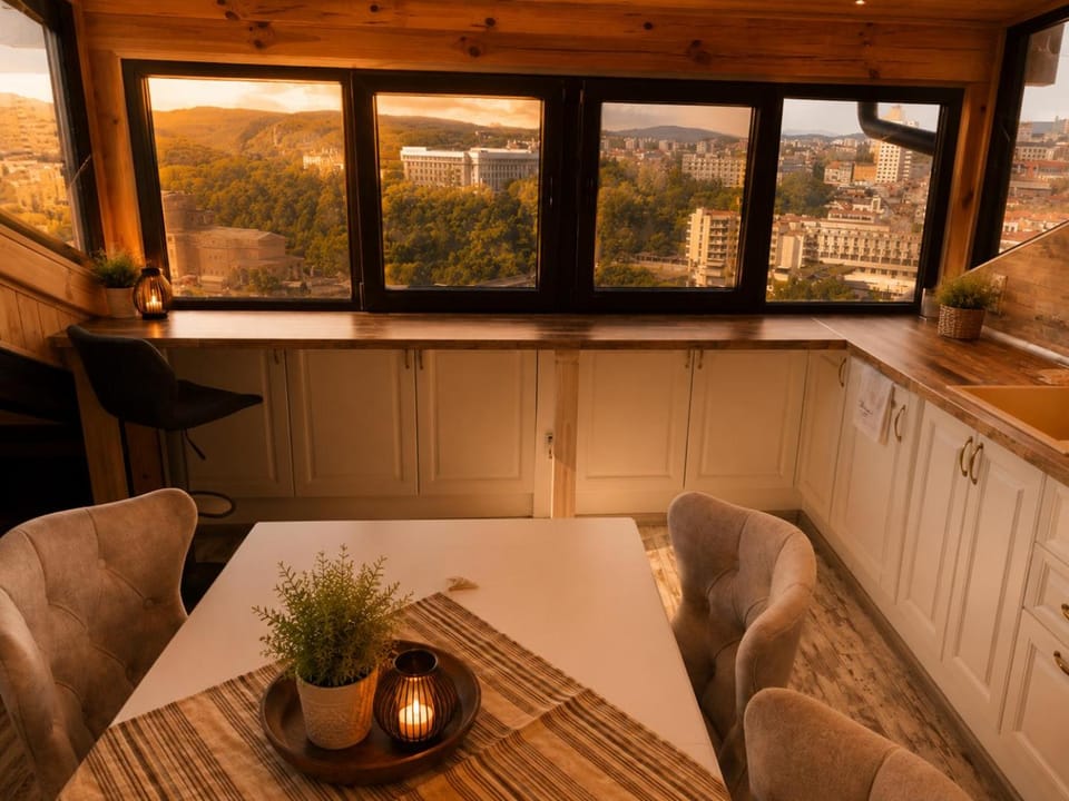 Natural landscape, Living room, Seating area, Dining area, Landmark view