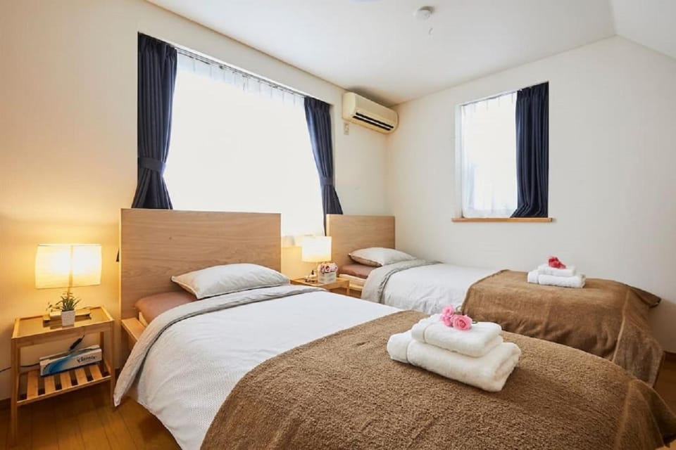Bed, Photo of the whole room, Bedroom, towels, air conditioner