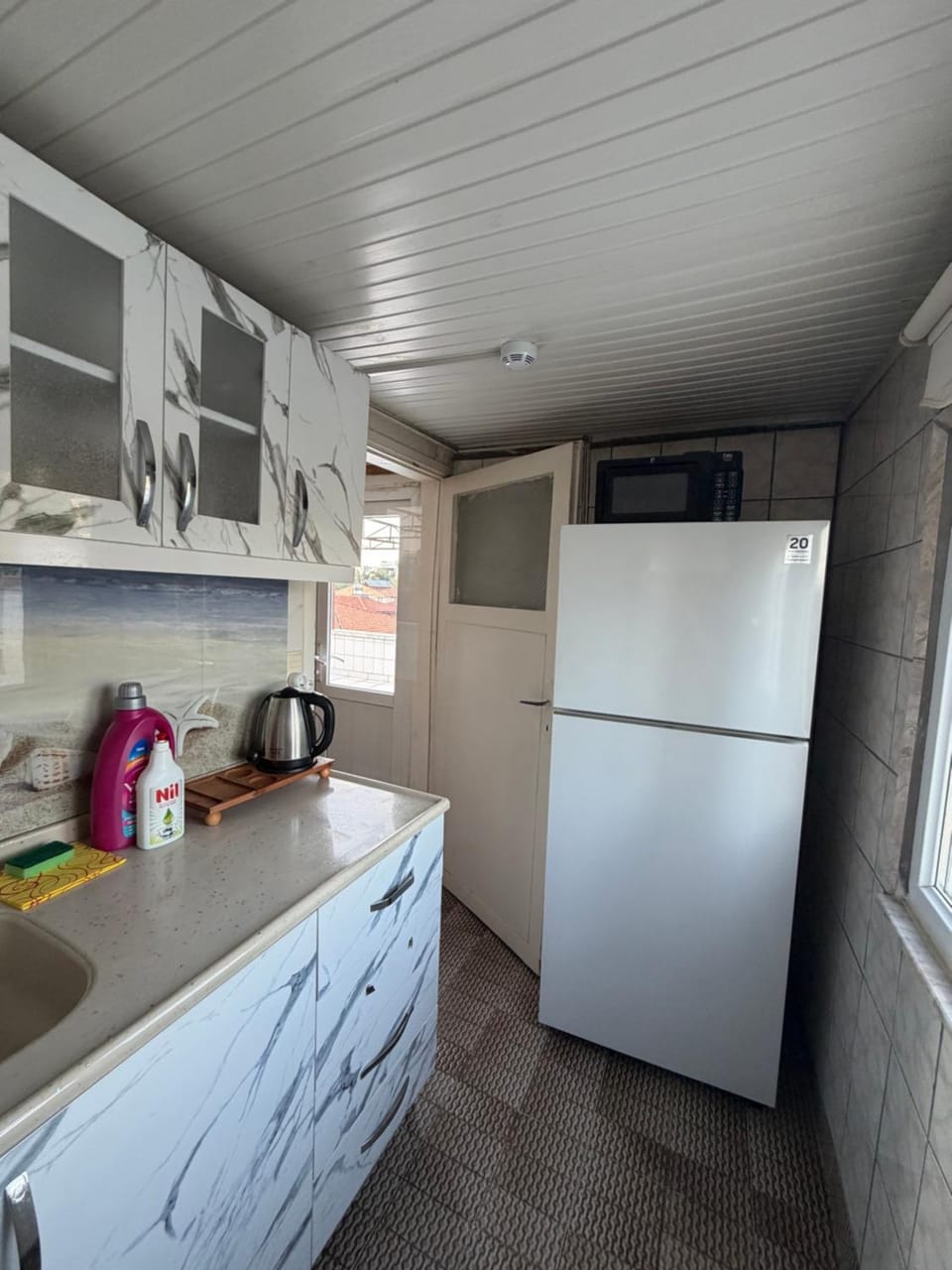 Kitchen or kitchenette, oven