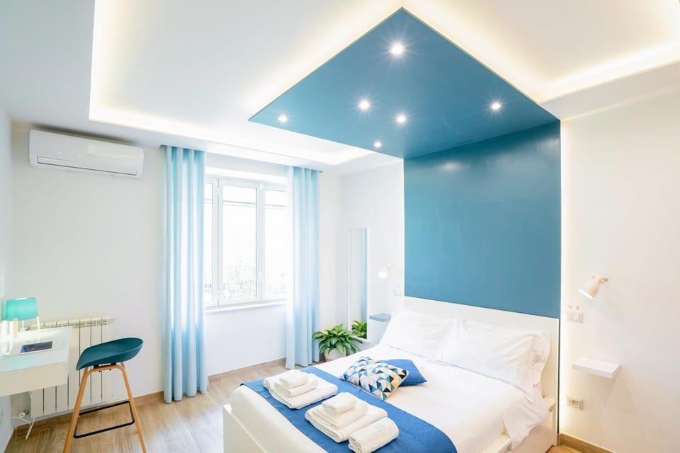 Bed, Photo of the whole room, Bedroom, towels, air conditioner