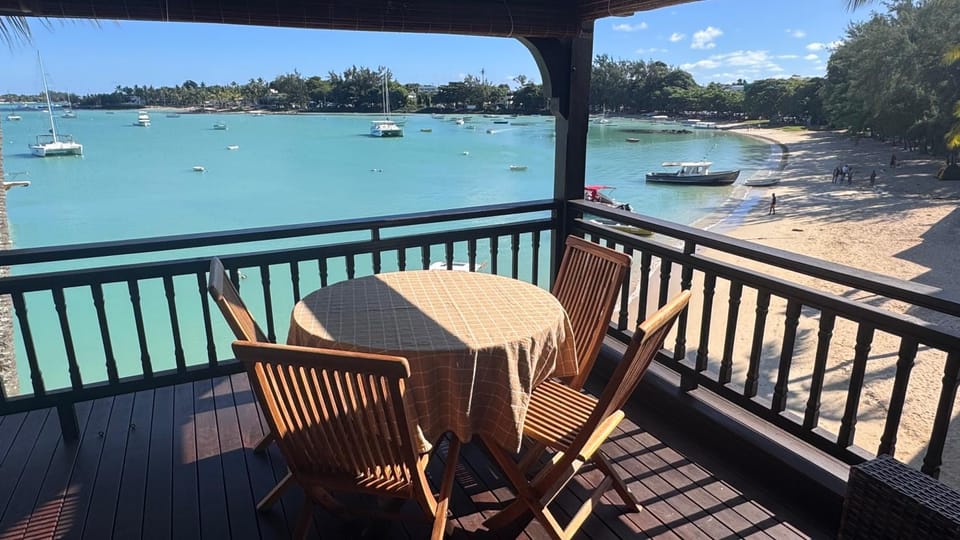 View (from property/room), Balcony/Terrace, Seating area, Beach, Sea view