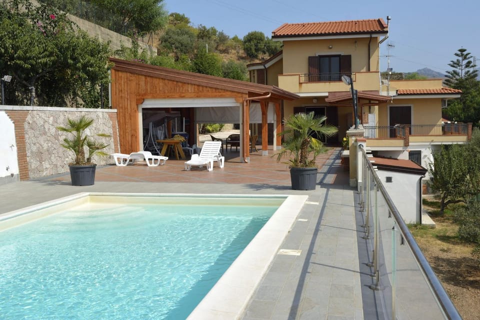 Property building, Patio, Pool view, Swimming pool, Swimming pool