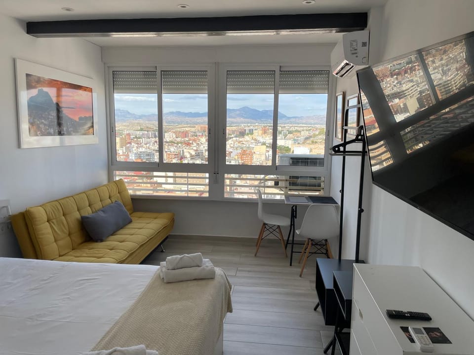 Bed, TV and multimedia, Living room, Photo of the whole room, Seating area, Bedroom