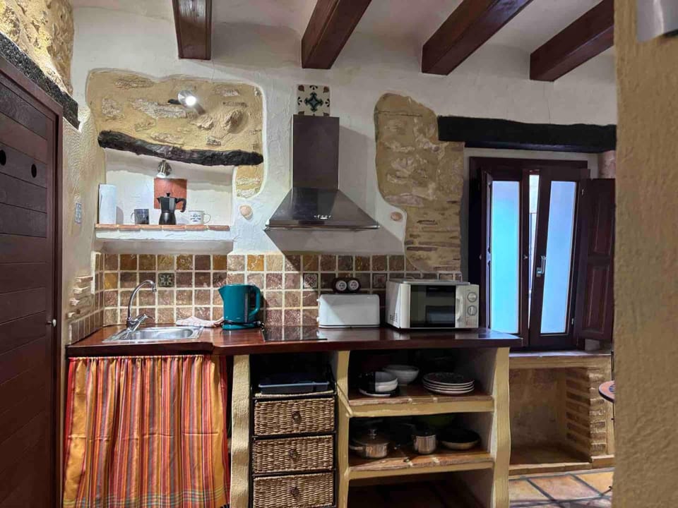 Kitchen or kitchenette, stove, toaster