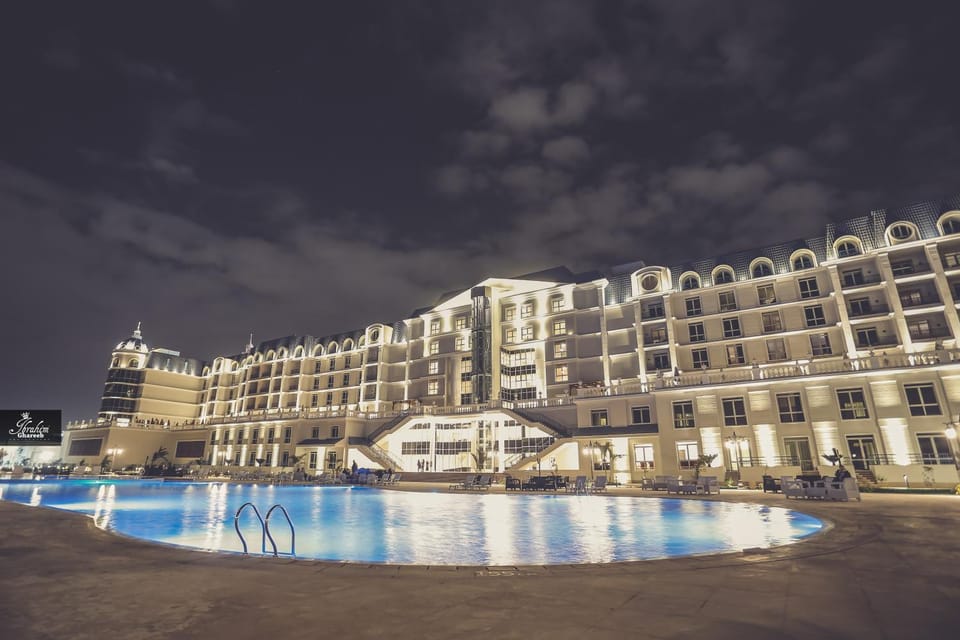 Property building, Night, Pool view, Swimming pool, sunbed