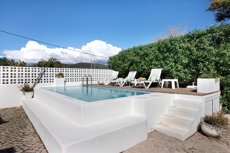 Property building, Living room, Swimming pool