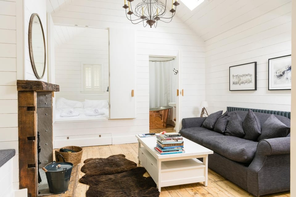 Bathroom, Living room, Seating area, Bedroom