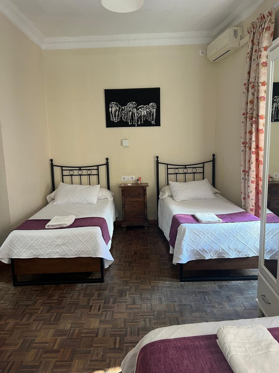 Bed, towels, air conditioner