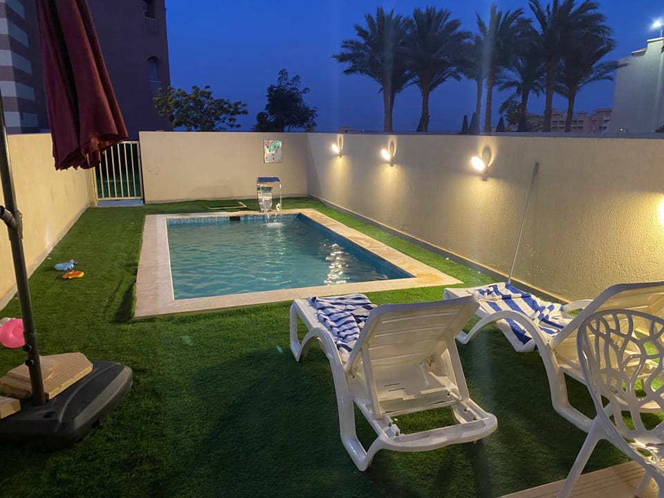 Patio, Pool view, Swimming pool, sunbed