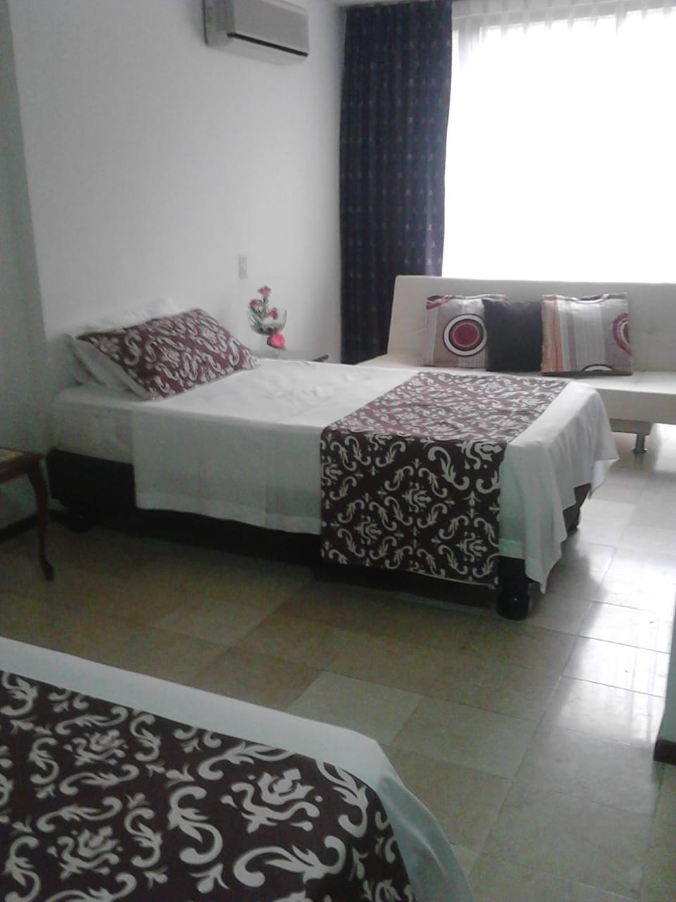 Photo of the whole room, air conditioner