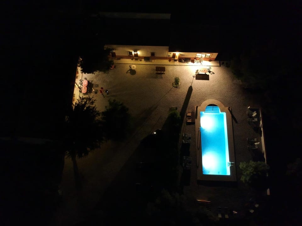 Property building, Night, Swimming pool