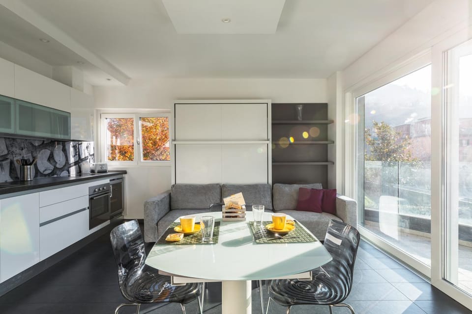 Kitchen or kitchenette, Living room, Seating area, Dining area