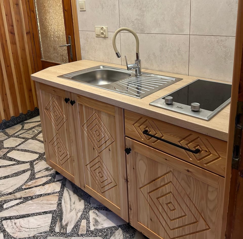 Kitchen or kitchenette, stove