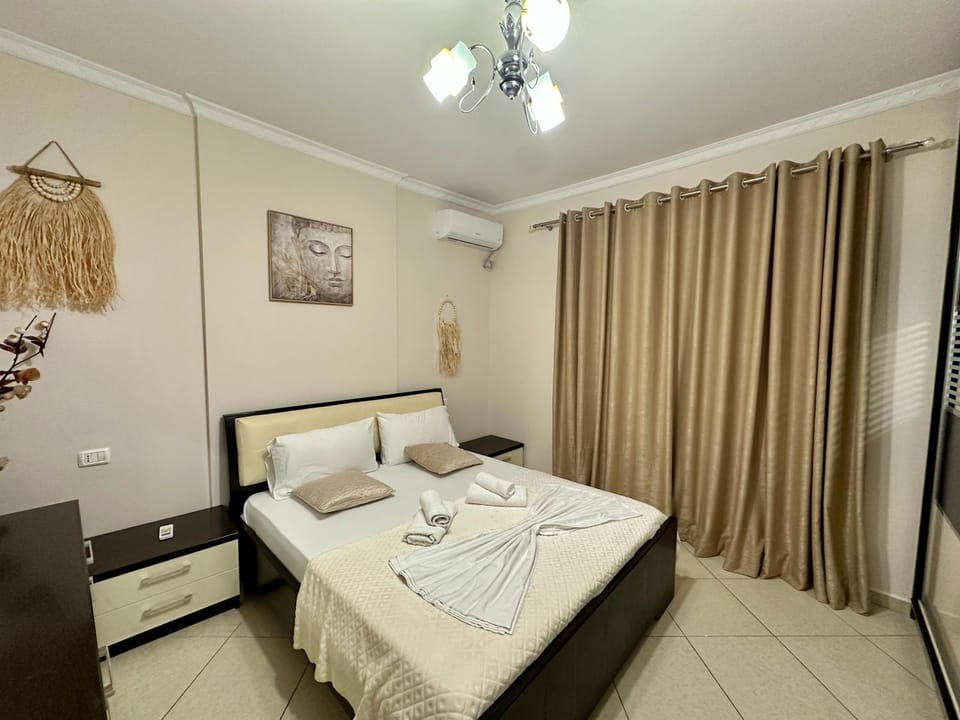 Bed, Photo of the whole room, Bedroom, towels, air conditioner