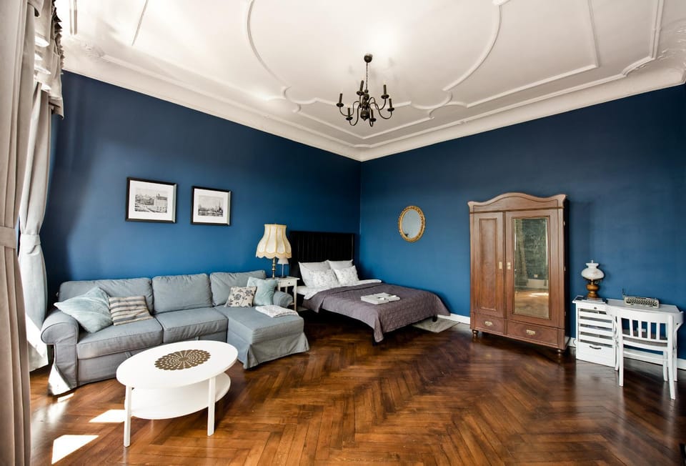 Bed, Living room, Seating area, Bedroom