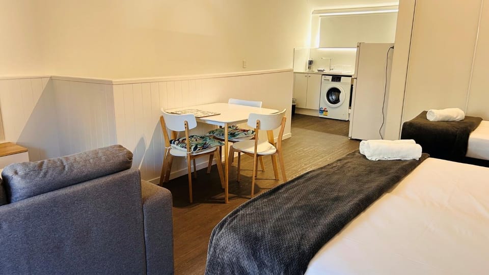 Bed, Living room, Seating area, Bedroom