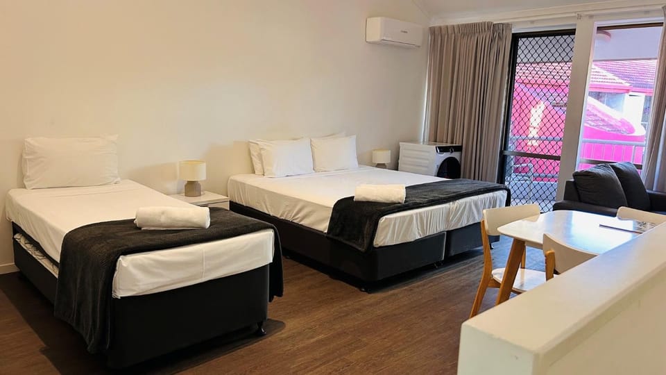 Bed, Living room, Seating area, Bedroom