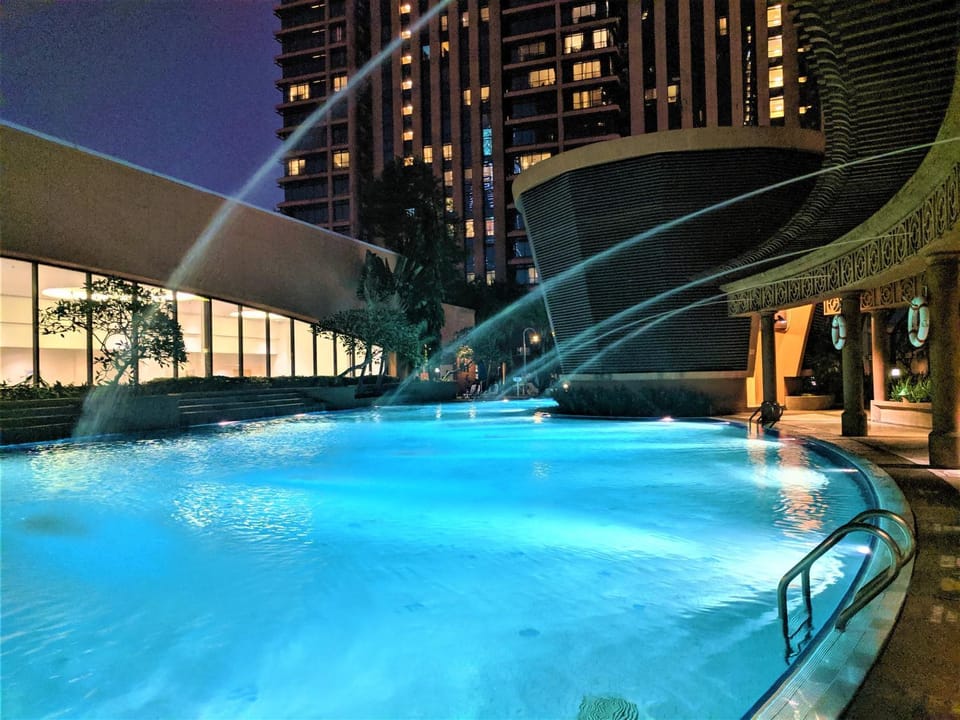 Property building, Night, Dining area, Pool view, Swimming pool